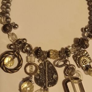 Elegant Silver and Gold Charm Necklace